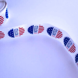 A roll of stickers with I Voted printed on them.