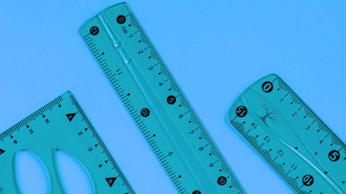 Three rulers on a blue background