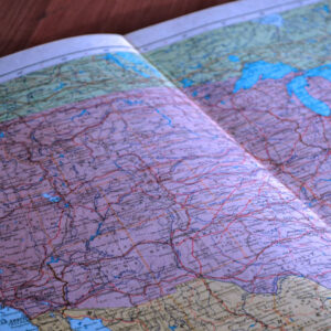 An atlas open to a map of the United States