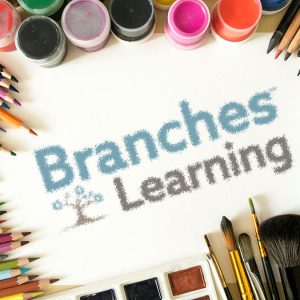Color Connections art supplies—including colored pencils, brushes, paint jars, and markers—are arranged around a sheet reading Branches Learning with a small tree illustration, perfect for Sketch & Doodle projects.