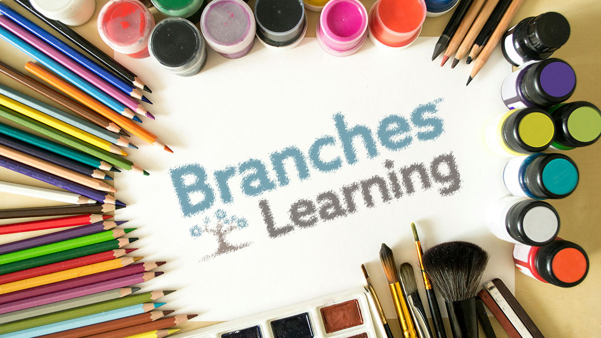 colored pencils and paint surrounding a branches learning logo sketch