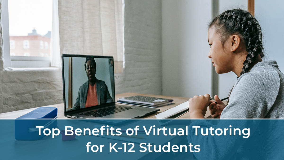 A young girl sits at a desk and engages in a Virtual Tutoring session with her tutor on a laptop. Text on the image reads, Top Benefits of Virtual Tutoring for K-12 Students.
